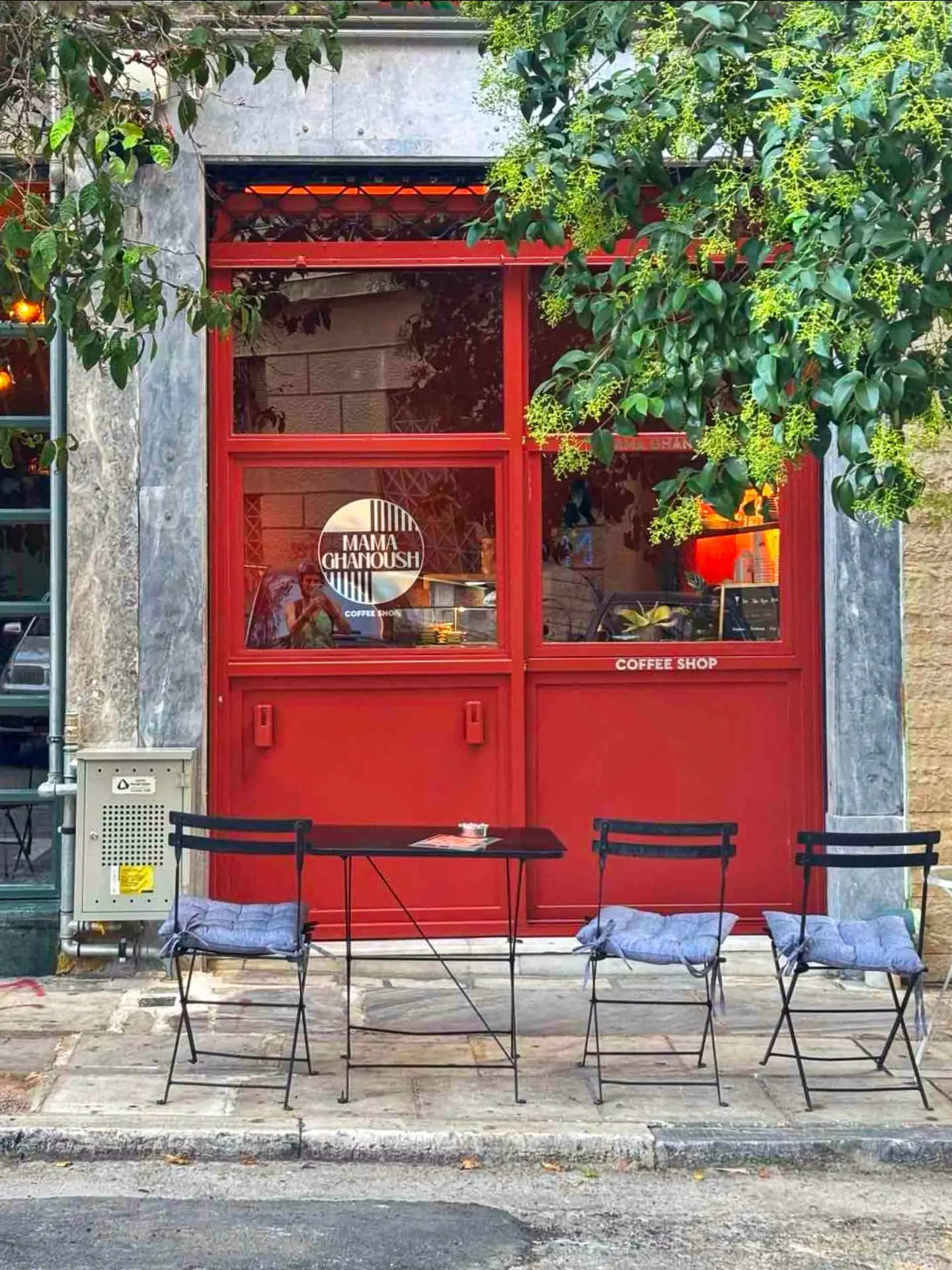 The red front door of the coffee shop